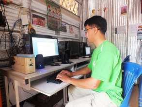 Using the computer in the refugee camp