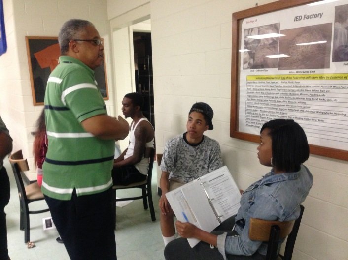 PGC faculty advisor with students