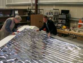 TBT: Lou Friedman & Bill Nye inspect LightSail '09