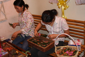 Mothers at Mai Tam work at flowershop to generate income