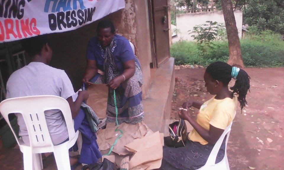 Tailor Teacher Explaining How To Do measurements