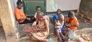 children picking beans for their meals