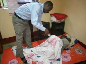 Doctor helping at GLH