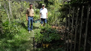 Renato, the greenhouse owner and me.