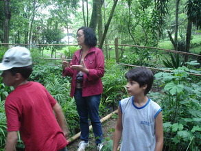 Teacher and students at the tree nursery.