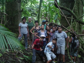 Group visiting ruins ancient coffee farm.