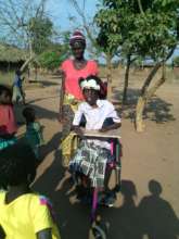 Patuma on her  new wheelchair