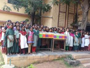 Poor Girl Children receiving Education Donations