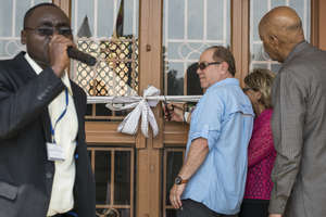 Cutting of the ribbon at the school entrance