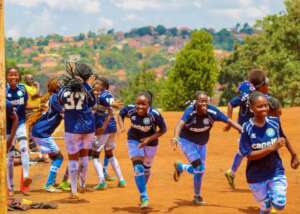 Kampala Girls League participants in celebration.