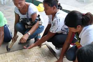 Training women on latrine construction