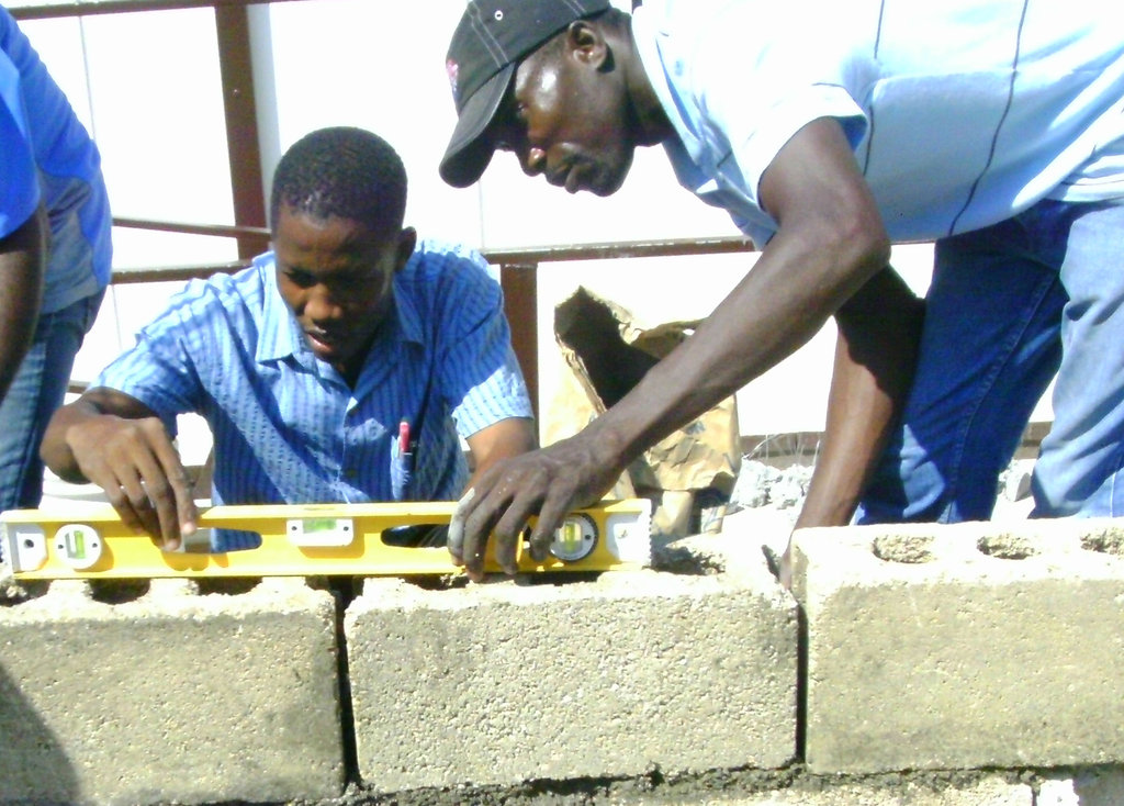 Train four builders in Haiti to build safer homes