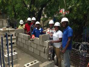 Senior construction trainer and trainees