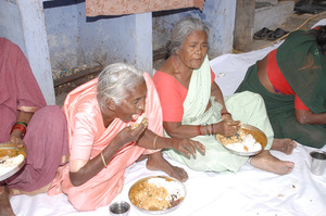 poor old age women having nutritious lunch