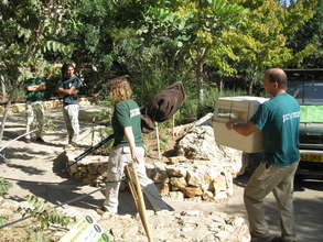 An otter is brought to the Otter Breeding Center