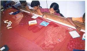 Children working in Handloom Zari