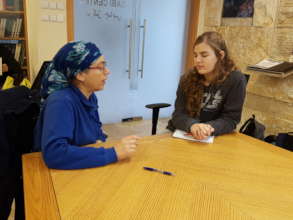 An academic mentor (senior vet) advises a student