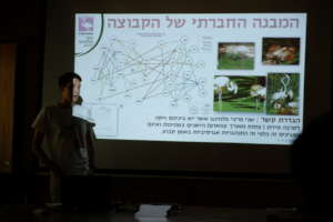 A student presents his research on flamingos