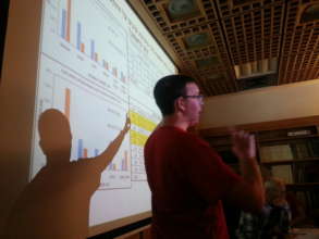 A student presents his research findings