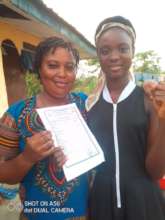 Ernestina & her aunt, celebrating her good grades!