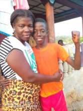 Mohamed & his aunt, excited about his good grades!