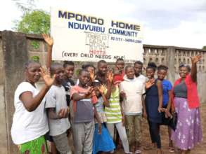 Mpondo Home staff & 11 orphans now with families