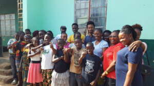 Former orphans pose with their new families!