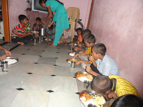 orphan children in joyhome orphanage for dinner