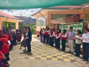 Teachers, Ruth and Gloria cheer girls achievements
