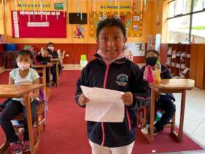 second grader is sharing her work