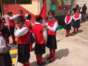 Students pass reps symbol to new class reps.