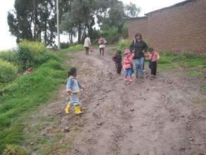 Teacher helping girls to school - van broke down