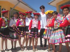 Admin. Ruth with girls all ready to dance for Peru