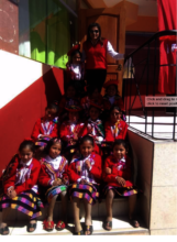 Teacher and girls celebrate Quechua heritage