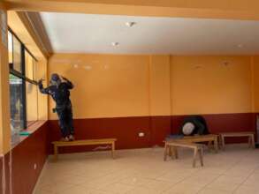 Parent gives face lift to daughter's school