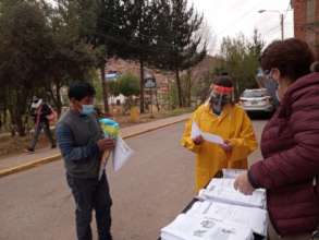 Ruth handing out new lessons and receiving work