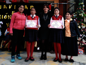 Top students with Ruth and mothers at graduation