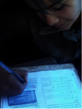 Student completes assignment-mother takes photo