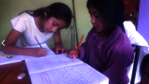 sisters at work learning