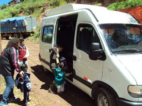 Teacher loads up youngest students to return home