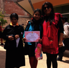 Graduation and top honors for Maria with mother