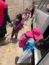 School ends and kinder first to get on the bus