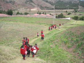 Leaving CW School during rains to meet the Van