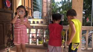 Eager to fill their cup with safe drinking water