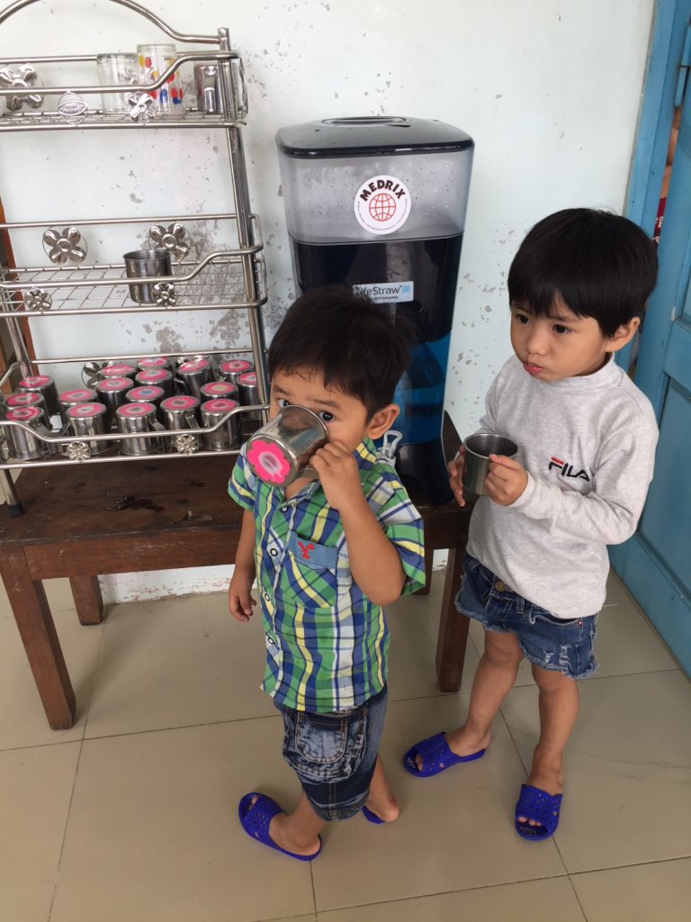 Kids drinking safe water