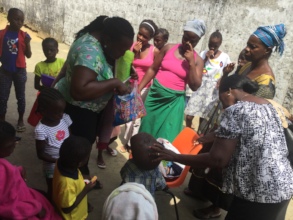Children receiving sweets and toys