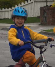 Happy kid on a refurbished bike!
