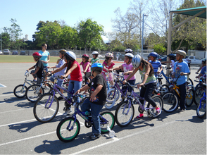 Bike safety instruction at Sunday Friends