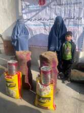 Beneficiaries receiving coal & food supply_Parwan