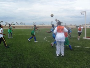 Girls and Women playing Netball